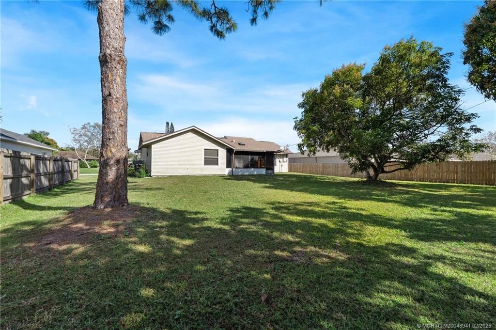 Photo of 556 NW Azine Avenue, Port Saint Lucie, FL 34983 (MLS # M20048941)