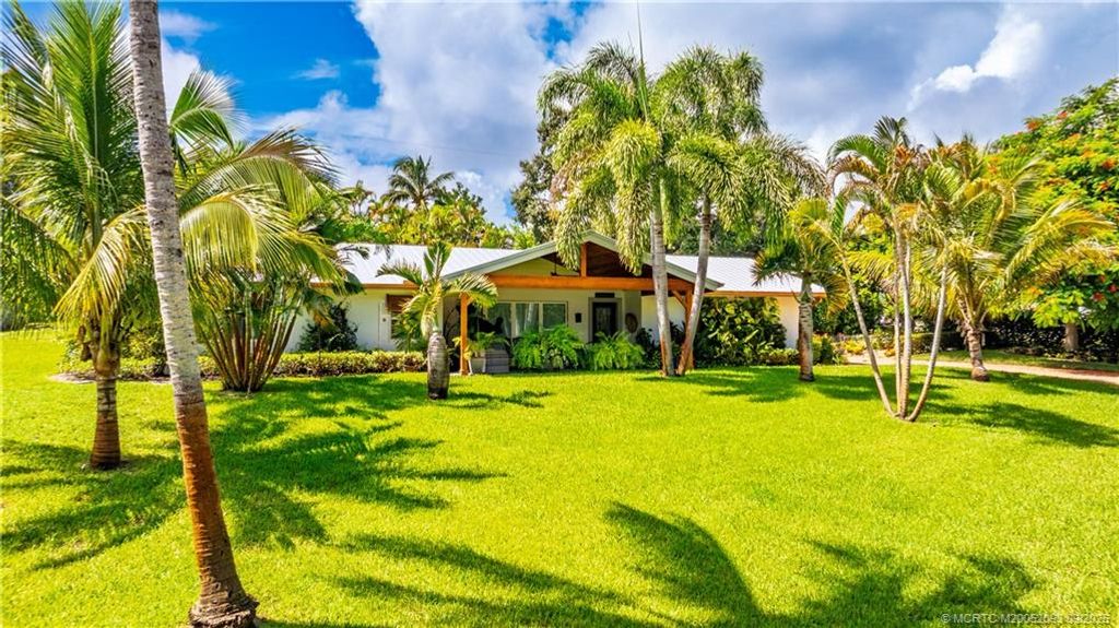 Photo of 1964 NE Lake Place, Jensen Beach, FL 34957 (MLS # M20052093)