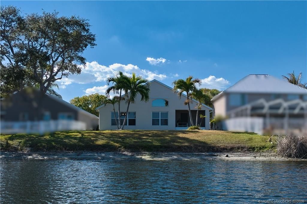 Photo of 849 NW Waterlily Place, Jensen Beach, FL 34957 (MLS # M20054343)