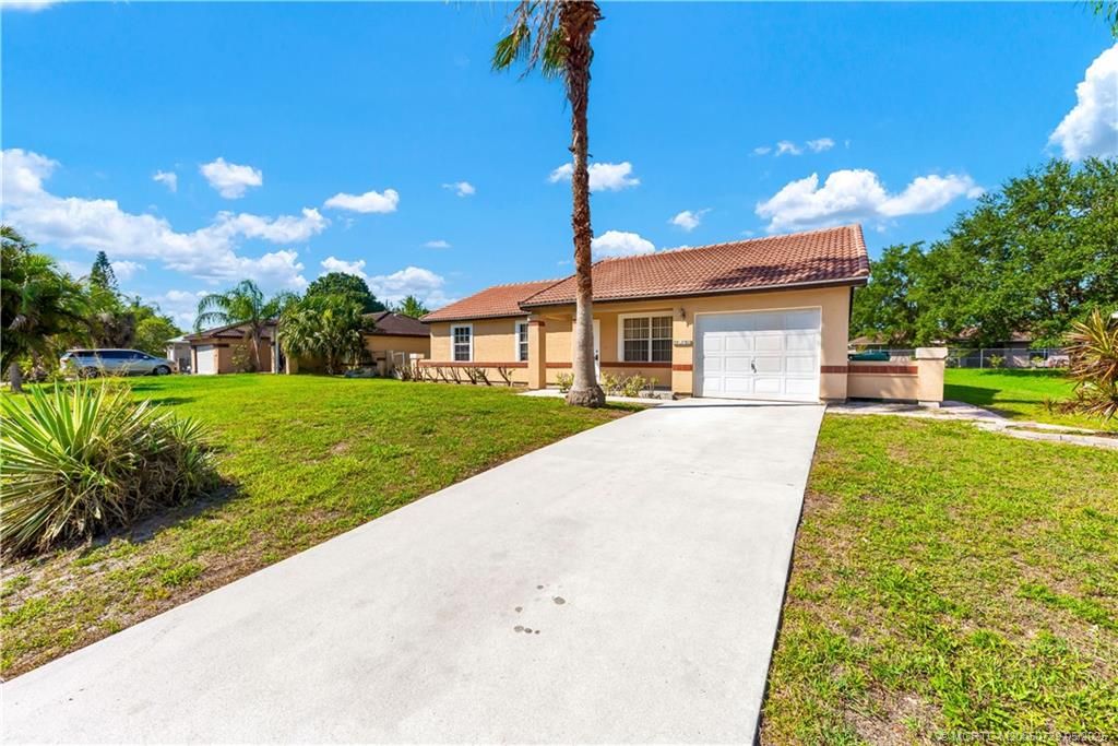 Photo of 2832 SW Ann Arbor Road, Port Saint Lucie, FL 34953 (MLS # M20050729)