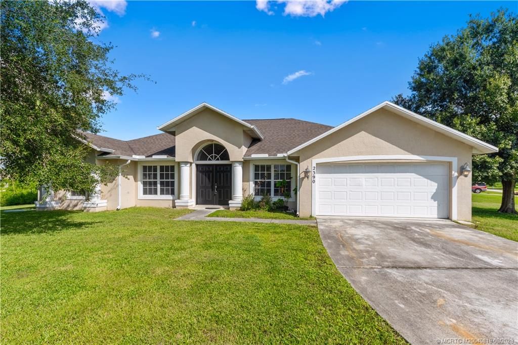 Photo of 2390 SE Haddon Street, Port Saint Lucie, FL 34984 (MLS # M20040819)
