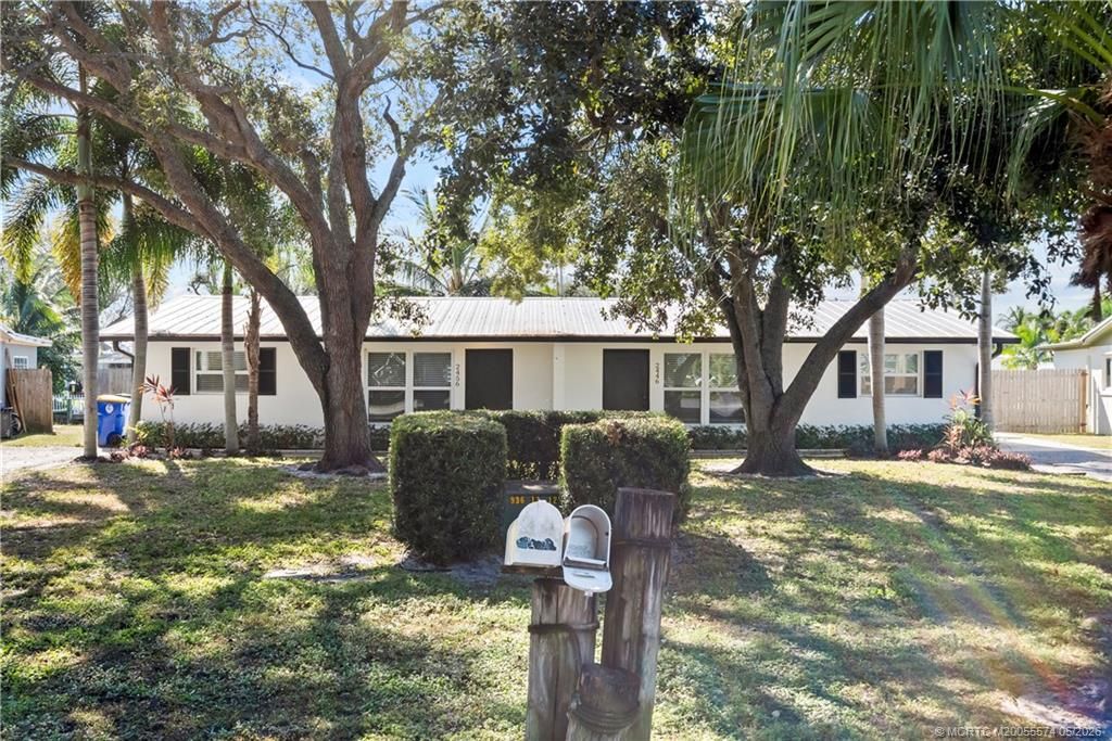 Photo of 2446 SW Hideaway Lane, Stuart, FL 34994 (MLS # M20055574)