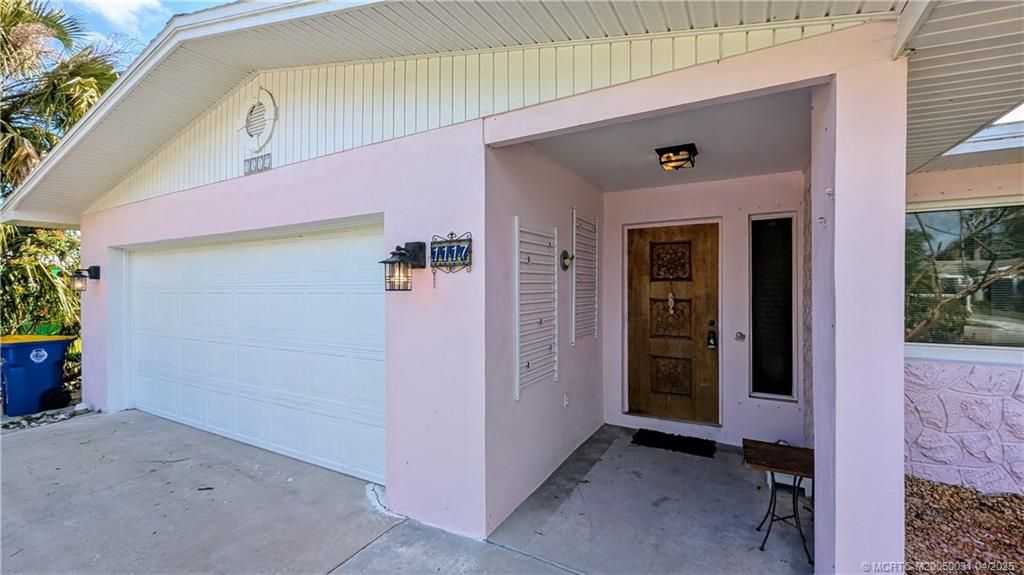 Photo of 1117 NE Kubin Avenue, Jensen Beach, FL 34957 (MLS # M20050031)