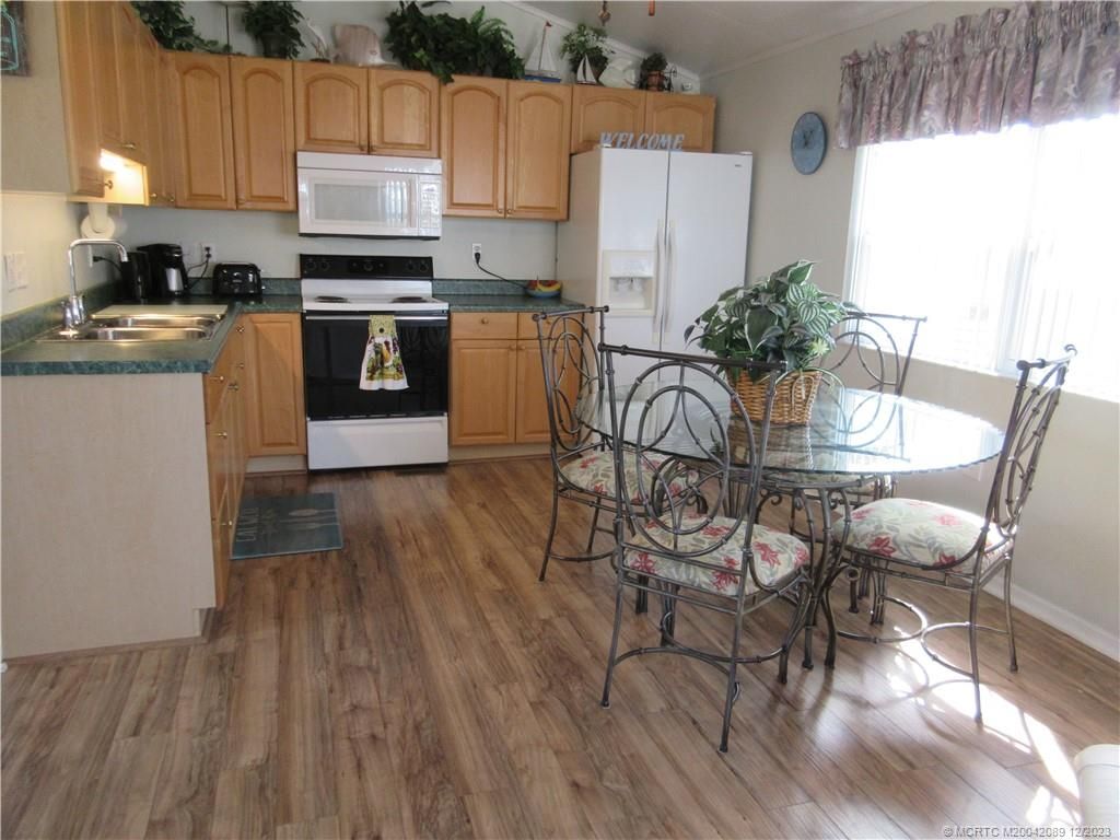 Photo of 1021 Nettles Boulevard, Jensen Beach, FL 34957 (MLS # M20042089)