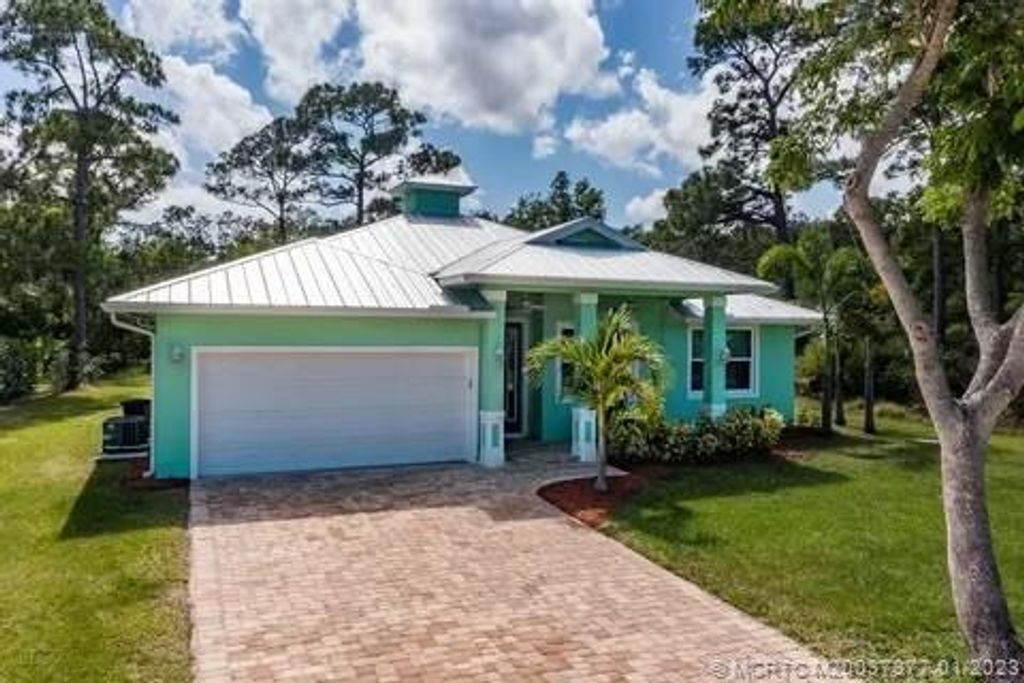 Photo of 5608 SE 44th Avenue, Stuart, FL 34997 (MLS # M20037377)
