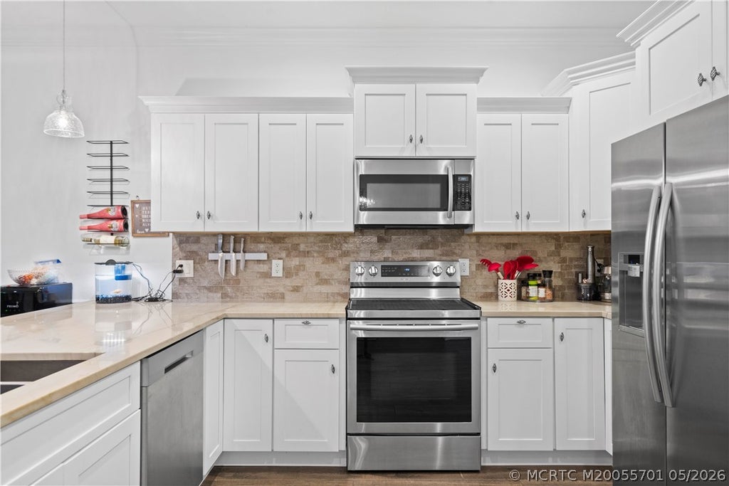 Photo of 5608 SE 44th Avenue, Stuart, FL 34997 (MLS # M20055701)