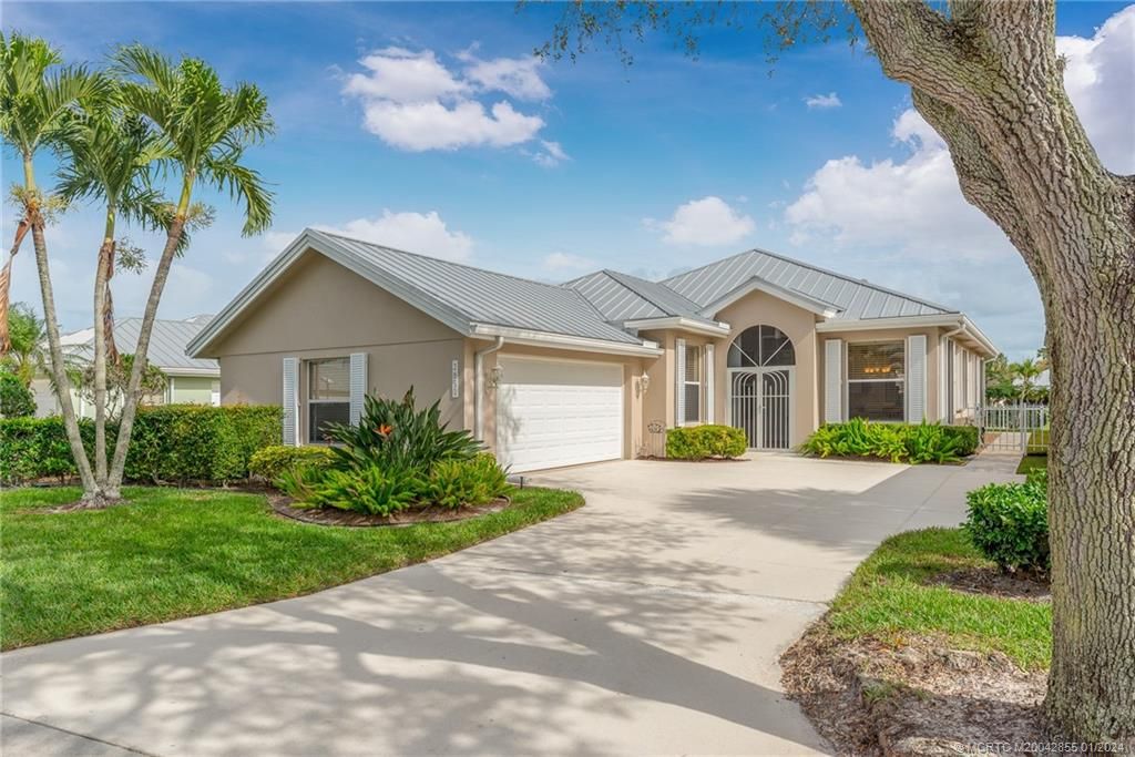 Photo of 2850 SW Brighton Way, Palm City, FL 34990 (MLS # M20042855)
