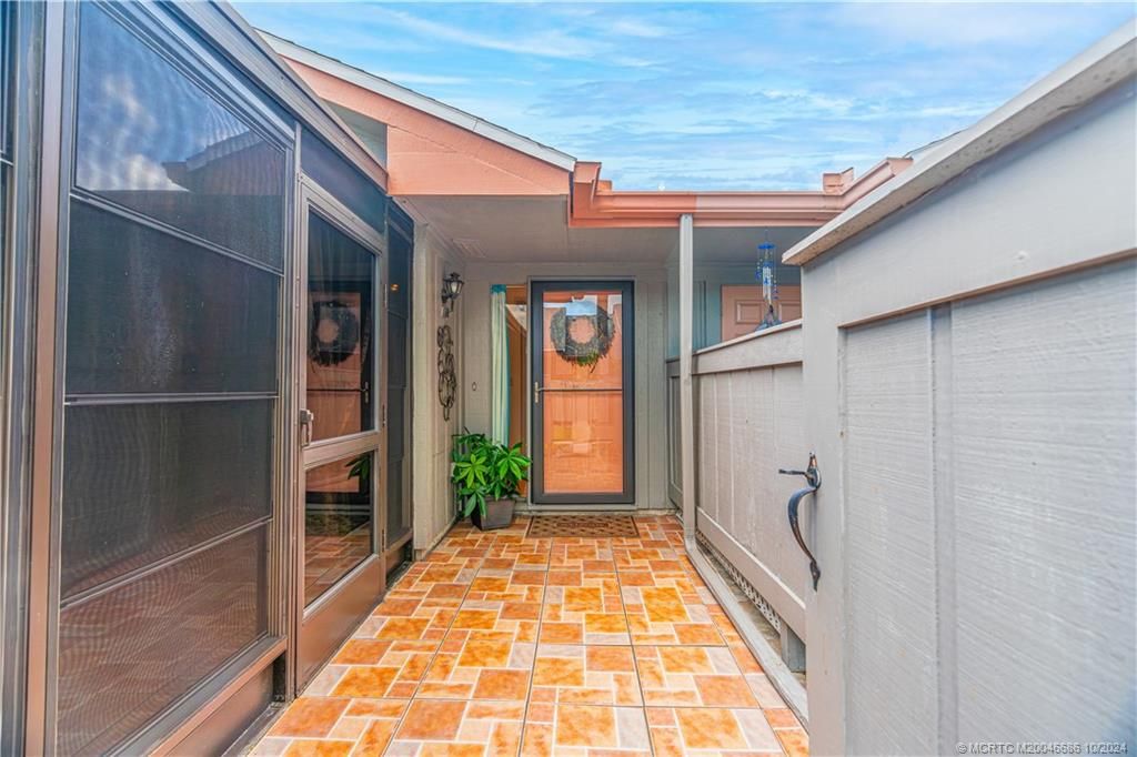 Photo of 4054 NW Cinnamon Tree Circle, Jensen Beach, FL 34957 (MLS # M20046686)