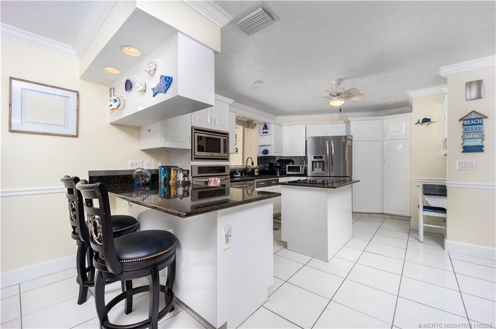 Photo of 980 Nettles Boulevard, Jensen Beach, FL 34957 (MLS # M20047876)