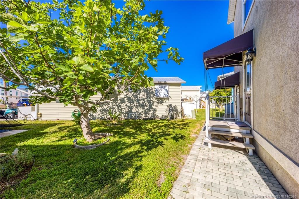 Photo of 980 Nettles Boulevard, Jensen Beach, FL 34957 (MLS # M20047876)