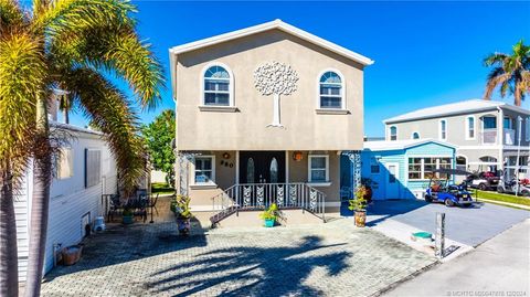 Photo of 980 Nettles Boulevard, Jensen Beach, FL 34957 (MLS # M20047876)