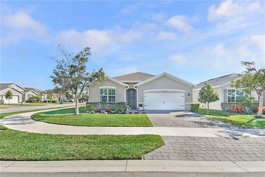 Photo of 1704 NE White Pine Terrace, Jensen Beach, FL 34957 (MLS # M20049585)