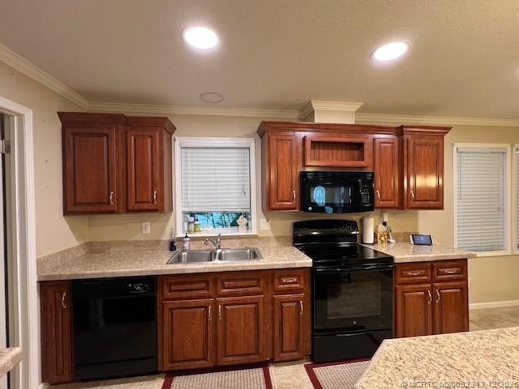 Photo of 4365 70th Court N #1343, Riviera Beach, FL 33404 (MLS # M20052343)