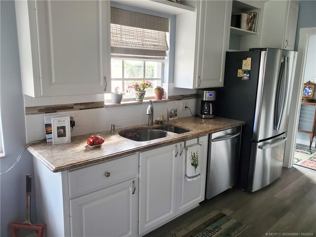 Photo of 8441 SE Retreat Drive, Hobe Sound, FL 33455 (MLS # M20046861)