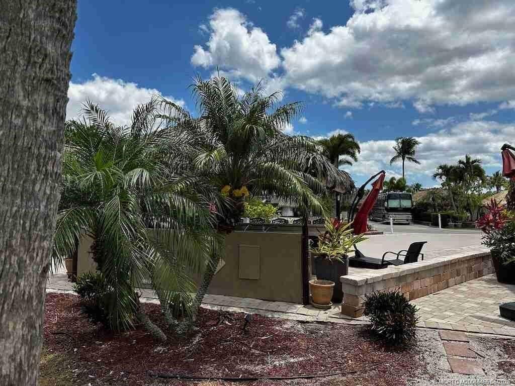Photo of 441 NW Sandtrap Lane, Port Saint Lucie, FL 34986 (MLS # M20055495)
