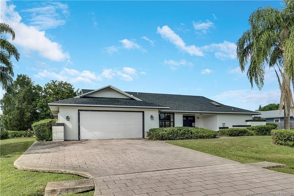 Photo of 1692 SE Mariner Lane, Port Saint Lucie, FL 34983 (MLS # M20052799)