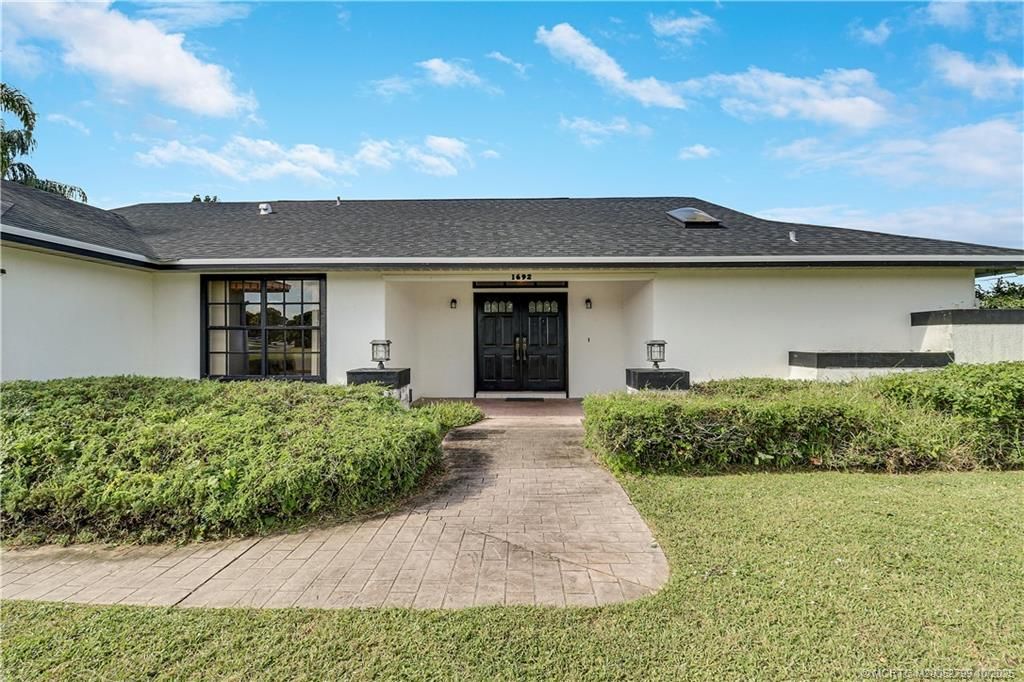 Photo of 1692 SE Mariner Lane, Port Saint Lucie, FL 34983 (MLS # M20052799)
