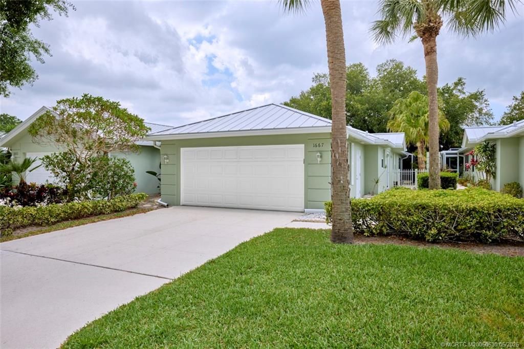 Photo of 1667 SW Waterfall Boulevard, Palm City, FL 34990 (MLS # M20050530)