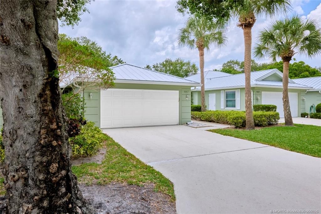 Photo of 1667 SW Waterfall Boulevard, Palm City, FL 34990 (MLS # M20050530)