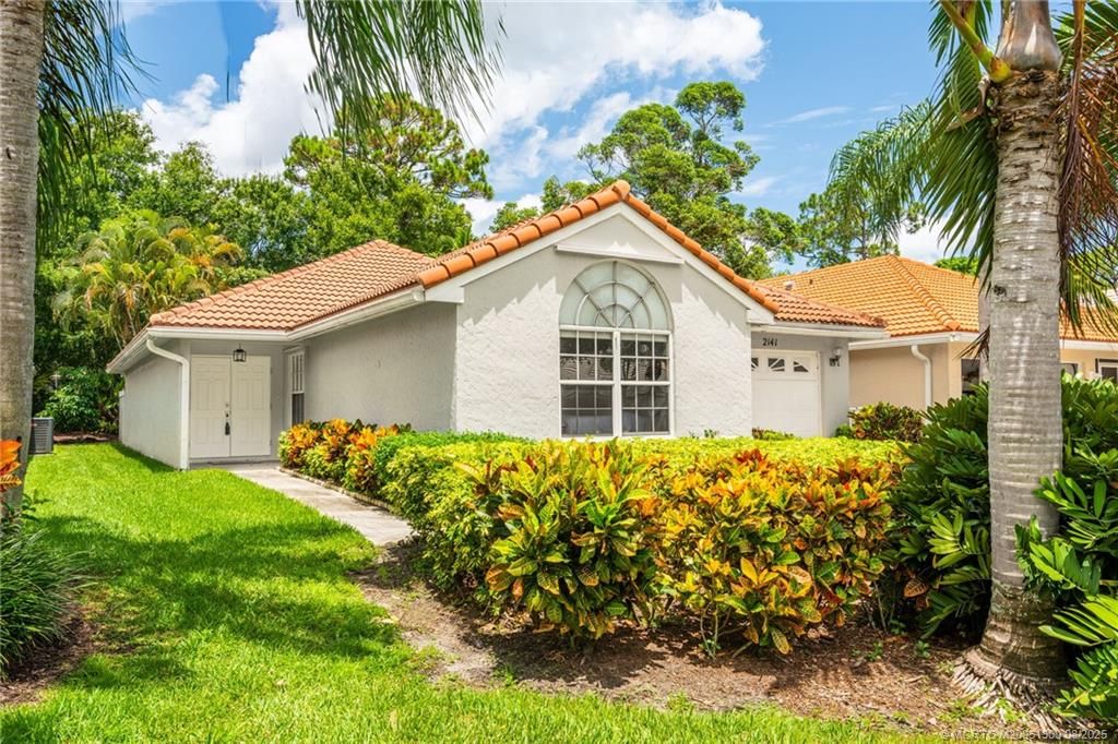 Photo of 2141 SW Olympic Club Terrace, Palm City, FL 34990 (MLS # M20051300)