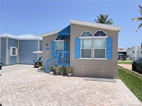 Photo of 2101 Nettles Boulevard, Jensen Beach, FL 34957 (MLS # M20050939)