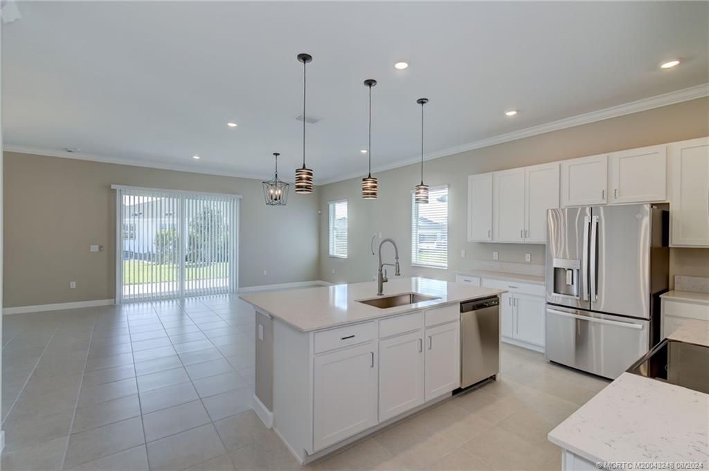 Photo of 1204 SE Woodbine Road, Port Saint Lucie, FL 34984 (MLS # M20043248)