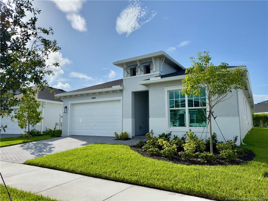 Photo of 1204 SE Woodbine Road, Port Saint Lucie, FL 34984 (MLS # M20043248)