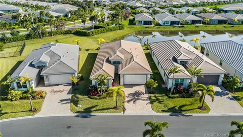Photo of 11797 SW Coral Cove Parkway, Port Saint Lucie, FL 34987 (MLS # M20048185)
