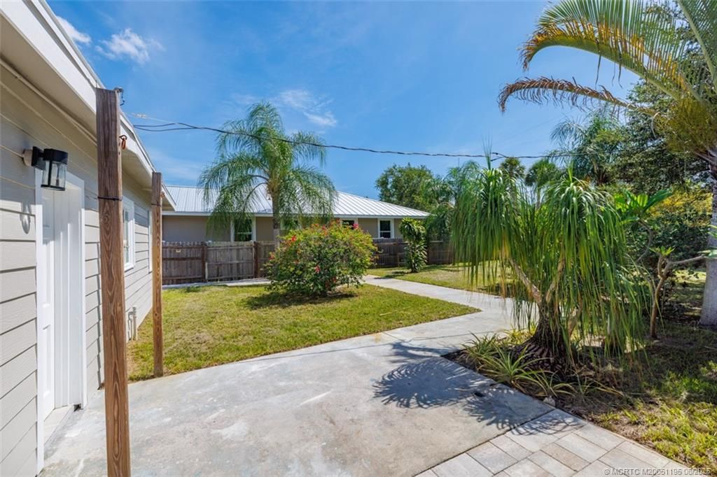 Photo of 1073 NE Orange Avenue, Jensen Beach, FL 34957 (MLS # M20051195)