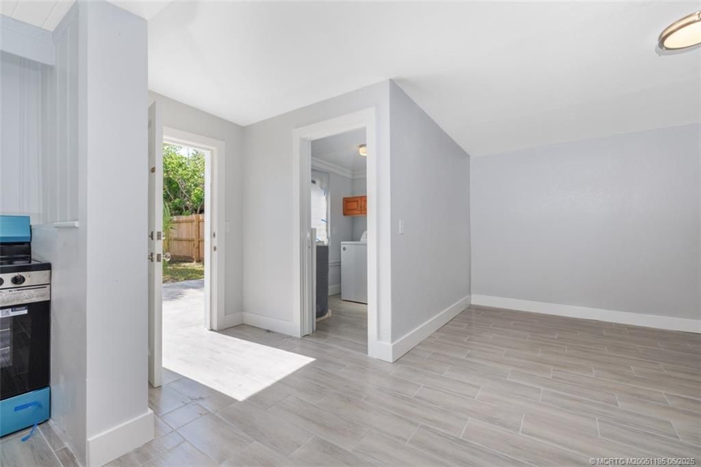 Photo of 1073 NE Orange Avenue, Jensen Beach, FL 34957 (MLS # M20051195)