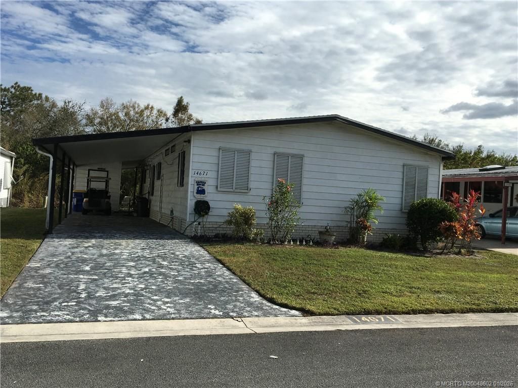 Photo of 14671 SW Divot Drive, Indiantown, FL 34956 (MLS # M20048602)