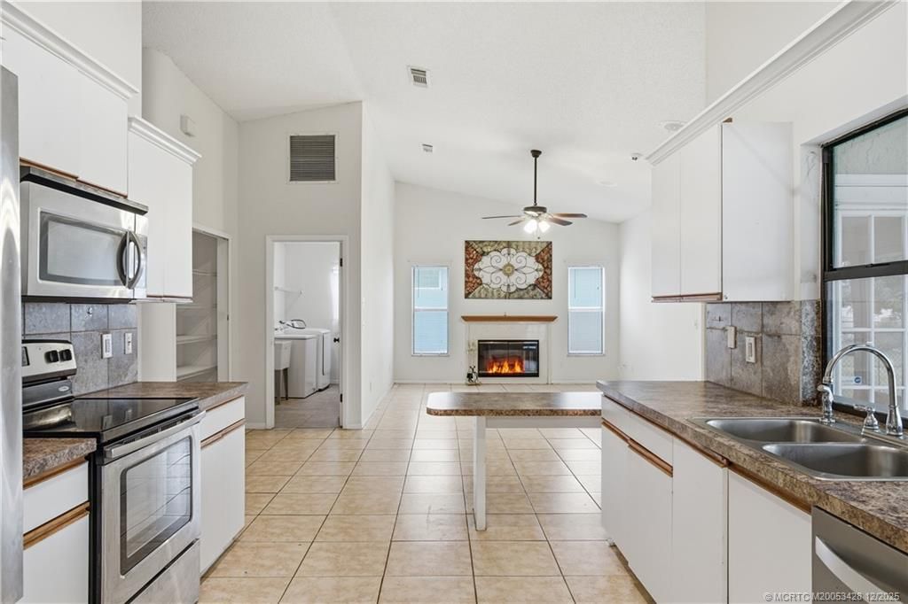 Photo of 950 SW Jaslo Avenue, Port Saint Lucie, FL 34953 (MLS # M20053428)