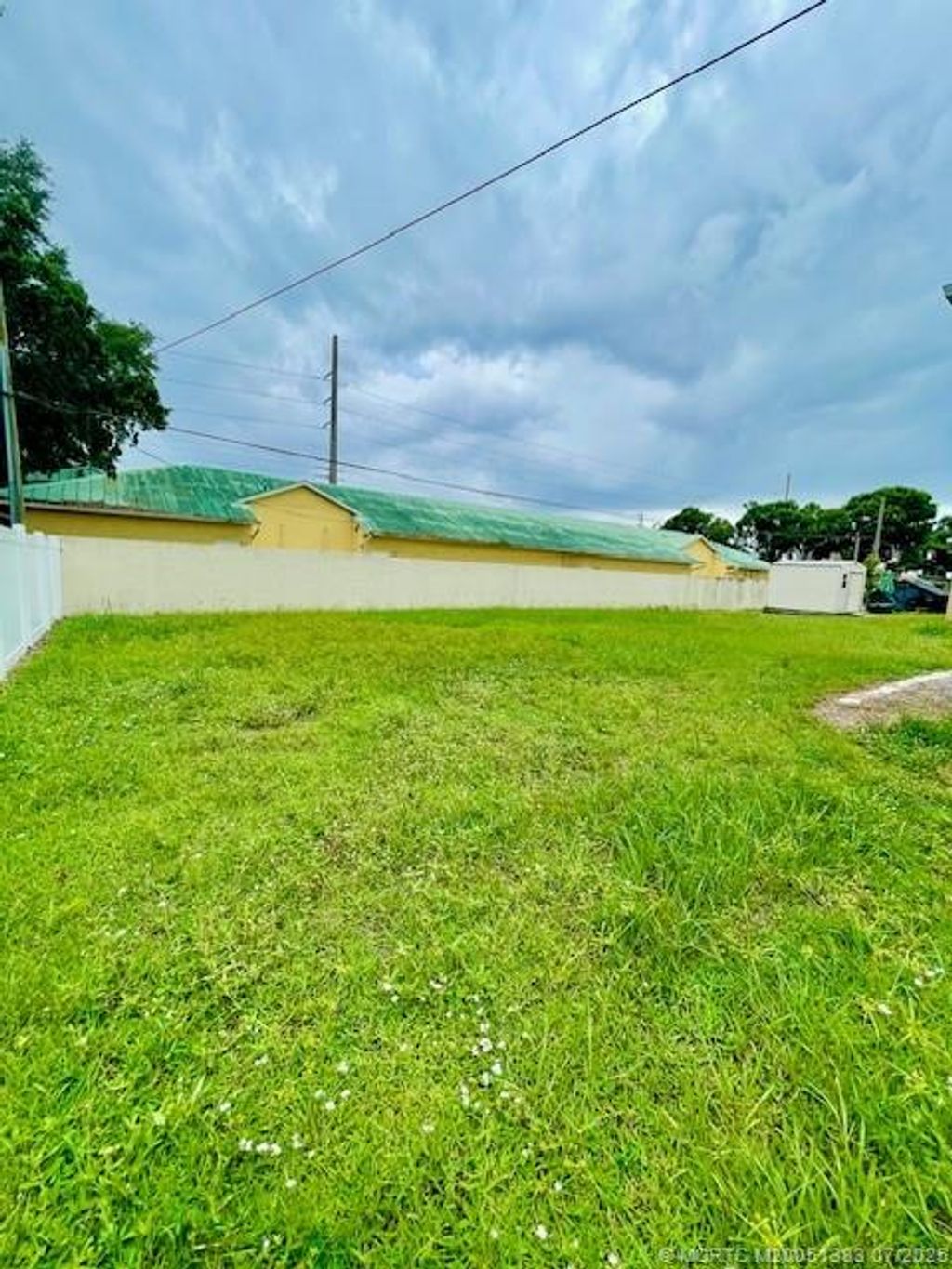 Photo of 656 SE Chapman Avenue SE, Port Saint Lucie, FL 34984 (MLS # M20051383)