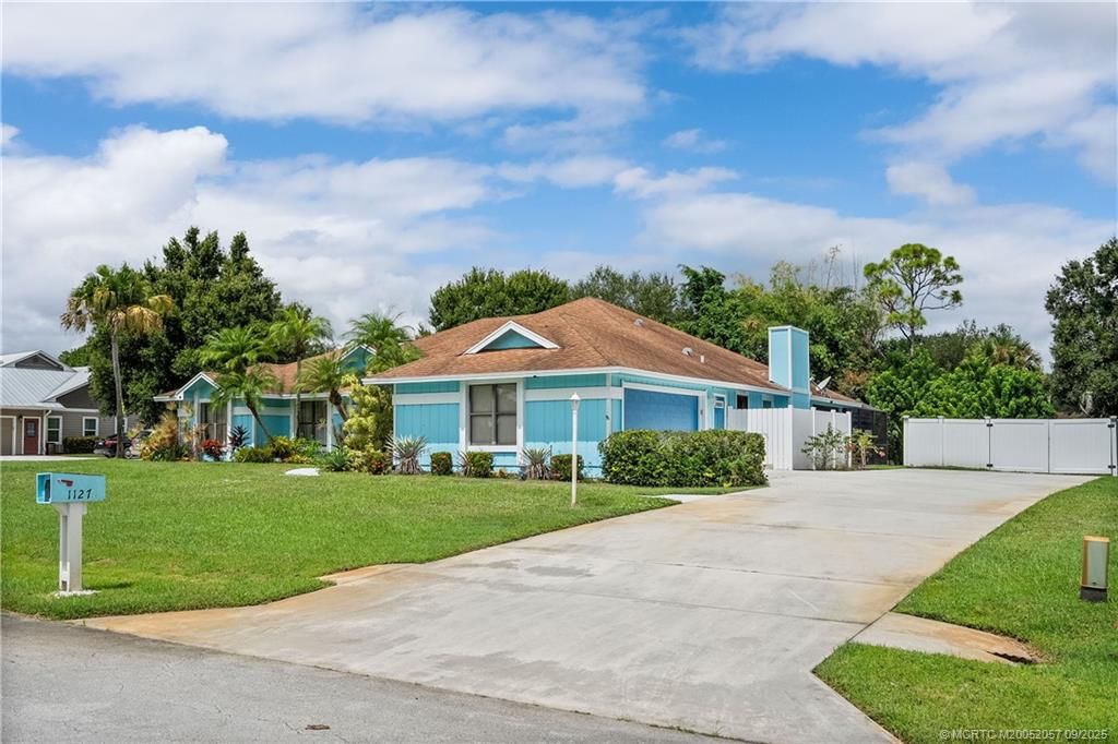 Photo of 1127 SW Catalina Street, Palm City, FL 34990 (MLS # M20052057)