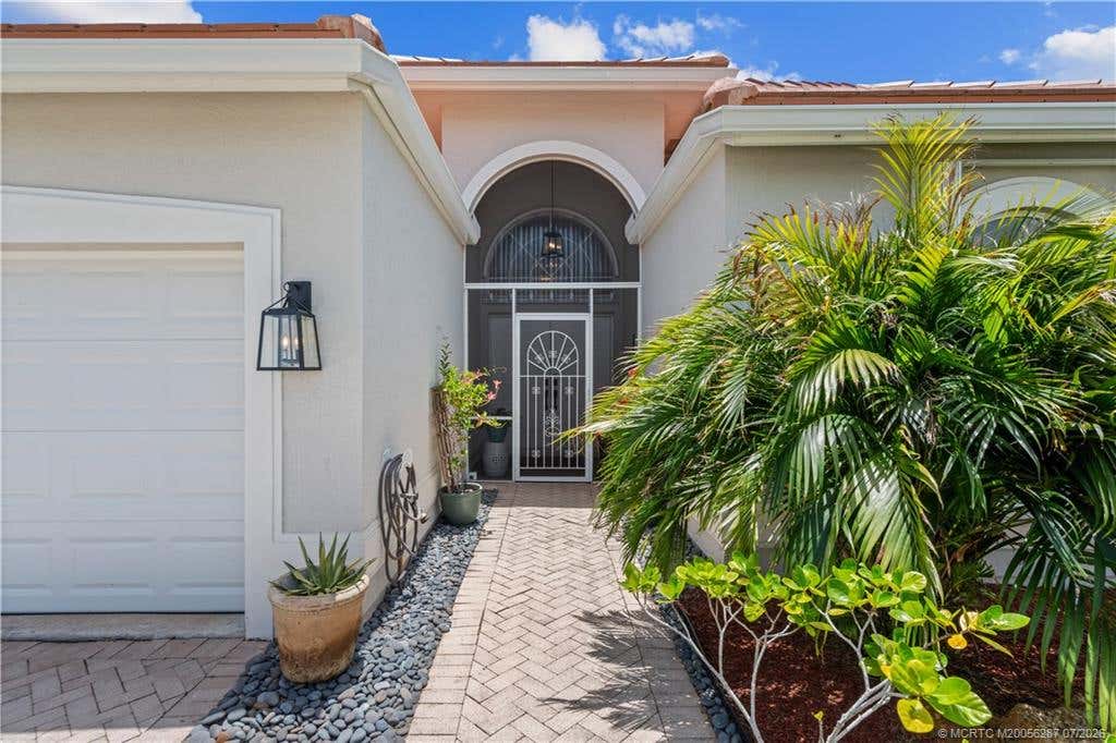 Photo of 1618 SE Shelburnie Way, Port Saint Lucie, FL 34952 (MLS # M20056287)