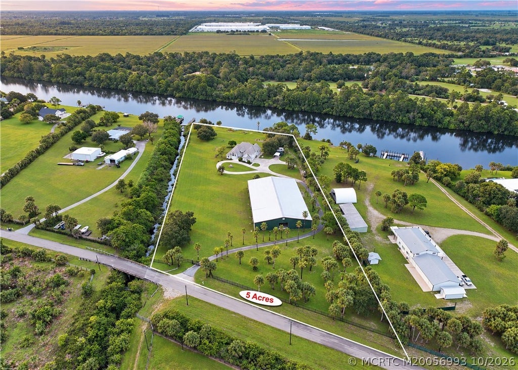 Photo of 10225 SW Green Ridge Lane, Palm City, FL 34990 (MLS # M20056993)