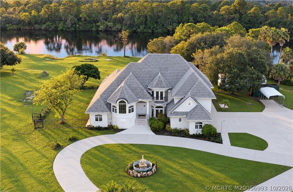 Photo of 10225 SW Green Ridge Lane, Palm City, FL 34990 (MLS # M20056993)
