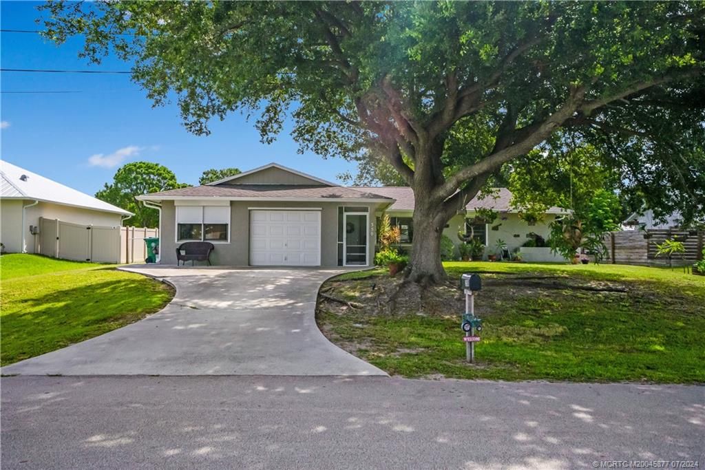 Photo of 350 SW Ridgecrest Drive, Port Saint Lucie, FL 34953 (MLS # M20045877)