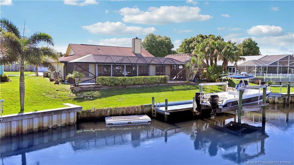 Photo of 1280 SW 25th Lane, Palm City, FL 34990 (MLS # M20055727)