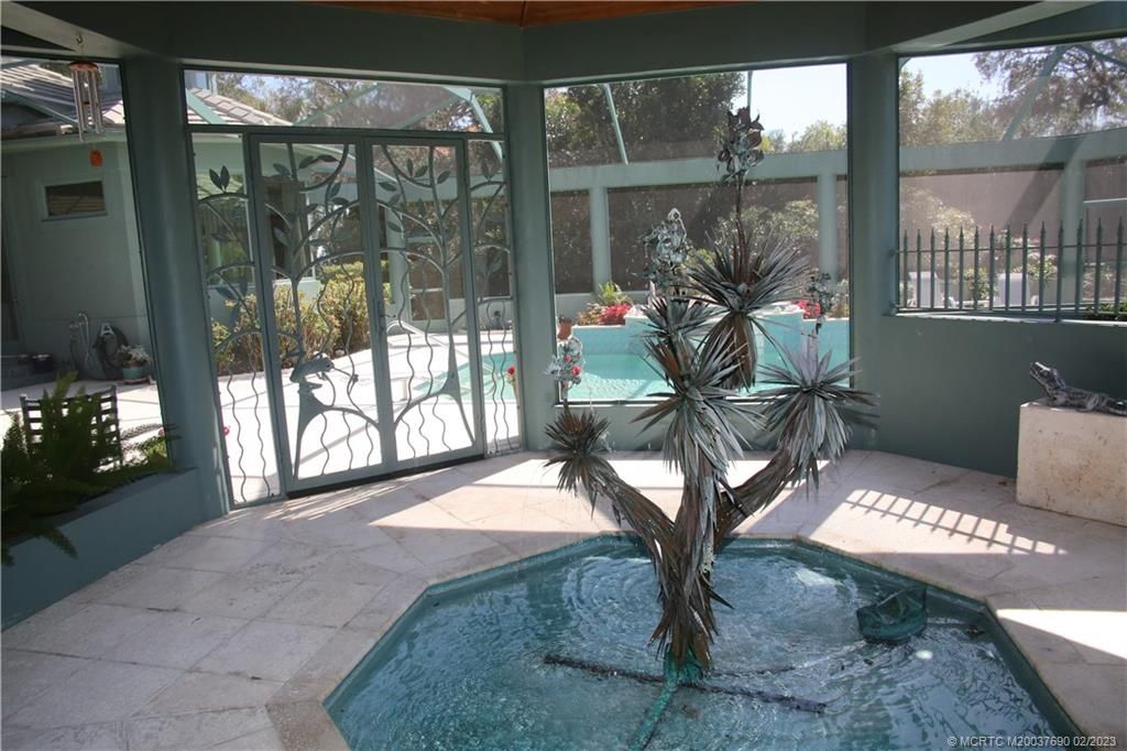 Photo of 504 NW Winters Creek Road, Palm City, FL 34990 (MLS # M20037690)