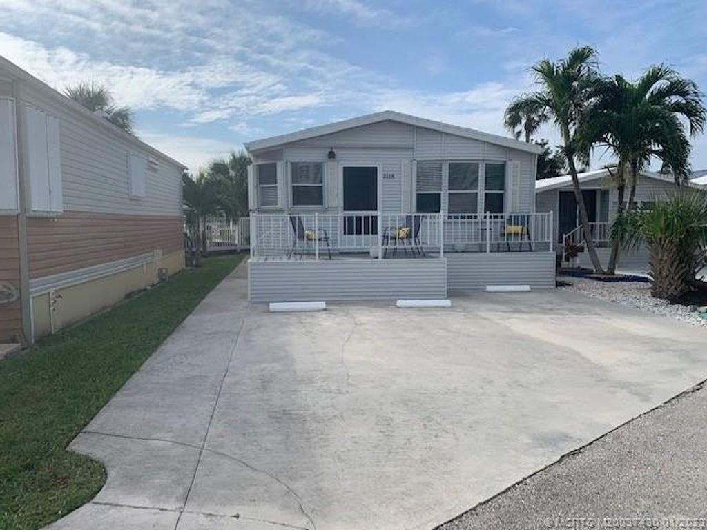Photo of 2119 Nettles Boulevard, Jensen Beach, FL 34957 (MLS # M20037430)
