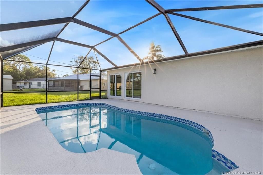 Photo of 2185 SE Holland Street, Port Saint Lucie, FL 34953 (MLS # M20047644)