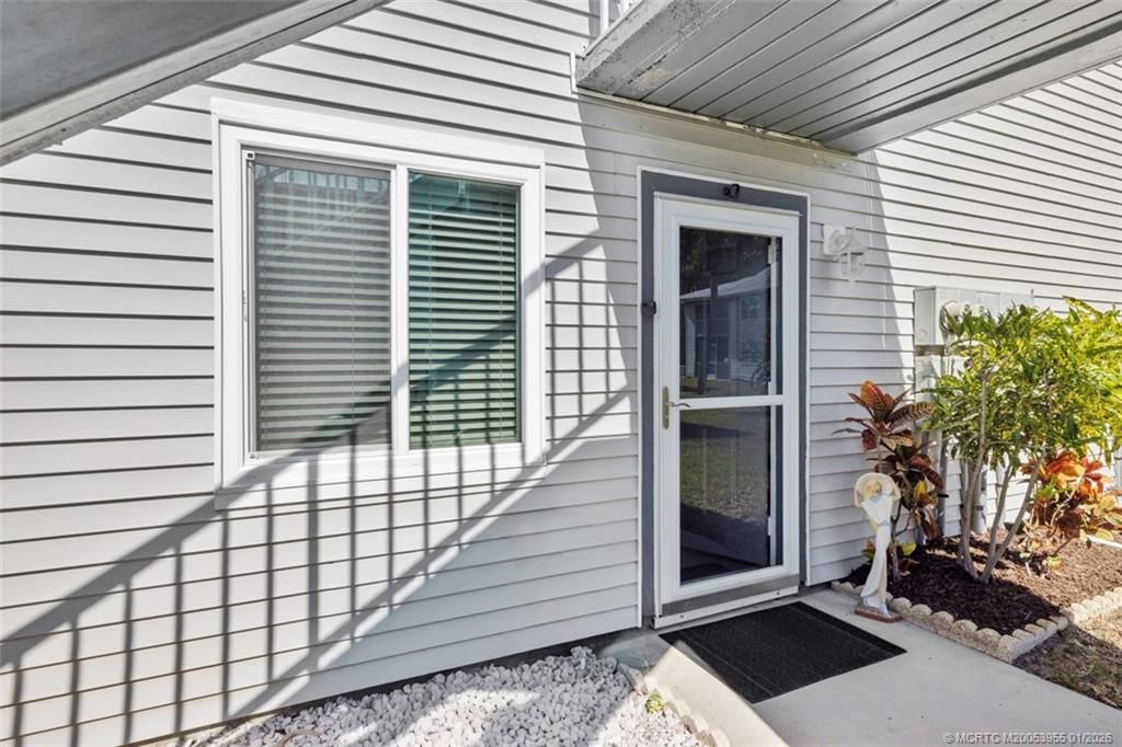 Photo of 142 SE Village Drive, Port Saint Lucie, FL 34952 (MLS # M20053955)