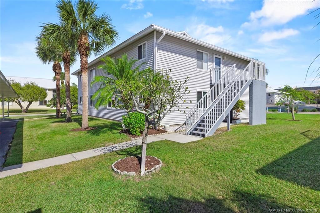 Photo of 142 SE Village Drive, Port Saint Lucie, FL 34952 (MLS # M20053955)