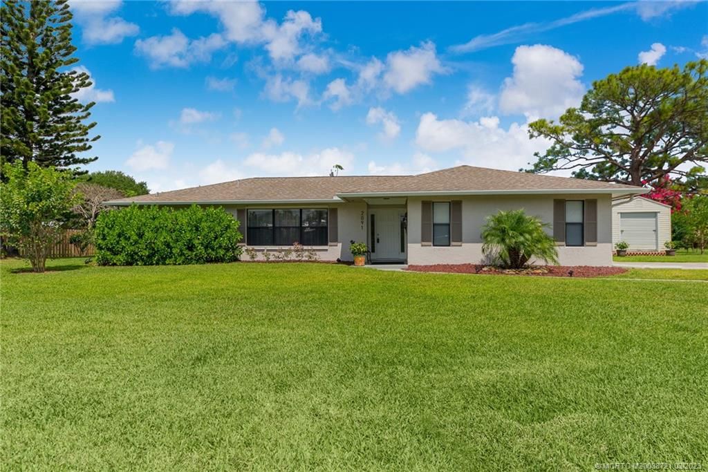 Photo of 2091 SE Westmoreland Boulevard, Port Saint Lucie, FL 34952 (MLS # M20038721)