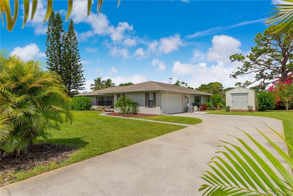 Photo of 2091 SE Westmoreland Boulevard, Port Saint Lucie, FL 34952 (MLS # M20038721)