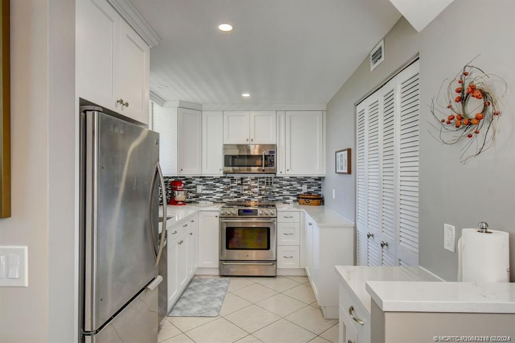 Photo of 3412 NE Causeway Boulevard #403, Jensen Beach, FL 34957 (MLS # M20043218)