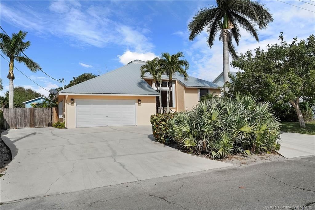 Photo of 5105 SE Matousek Street, Stuart, FL 34997 (MLS # M20048296)