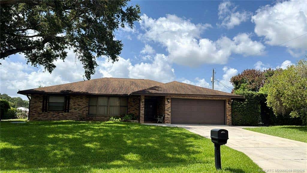 Photo of 160 SE Todd Avenue, Port Saint Lucie, FL 34983 (MLS # M20056269)