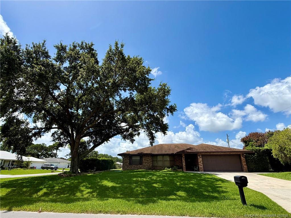 Photo of 160 SE Todd Avenue, Port Saint Lucie, FL 34983 (MLS # M20056269)